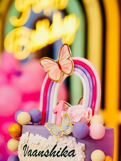 A duplicate image of the beautiful butterfly-themed cake, showing the intricate details that tie into the overall party design.