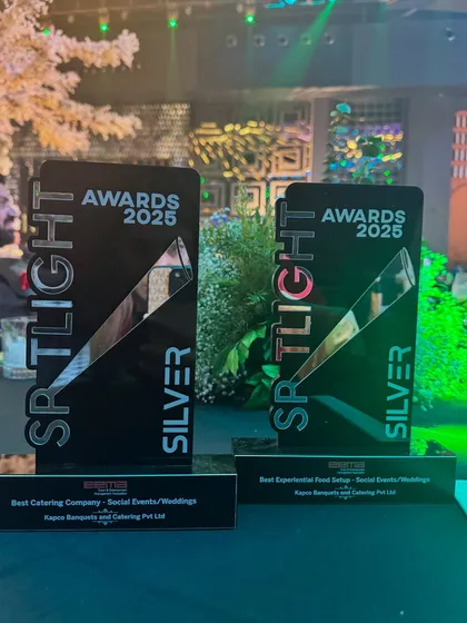 Both of our Spotlight Awards 2025 displayed together. These accolades for both our setups and our overall service reinforce our position as a leader in the catering industry.