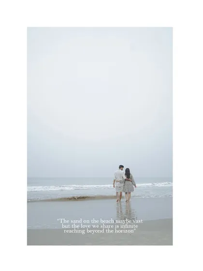 A minimalist and poetic shot of the couple walking along the beach. The vast, open space and the quote about infinite love create a deeply romantic and artistic pre-wedding image.
