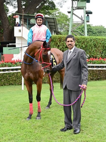 Armory, with jockey Angad, stands for a photo after a commanding victory in The Raja of Bobbili Memorial Trophy.