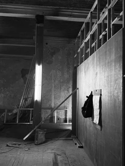 An atmospheric shot from a new project on the horizon. The interplay of light, shadow, and raw materials like wood and plaster hints at the careful, layered process of creation we are embarking on.