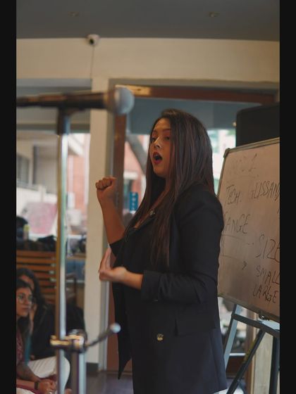 Demonstrating a vocal technique to the group. Practical, physical examples are a key part of how I teach.