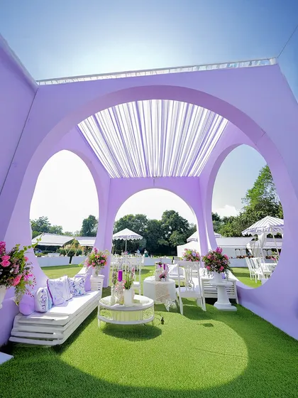 Another view of the beautiful lavender lounge, showcasing how the structure frames the outdoor scenery. I focus on creating decor that is not only beautiful but also functional and experiential.