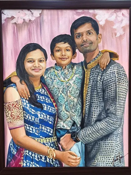 A beautiful family of three, captured in their traditional Indian attire. I paid close attention to the intricate patterns on their clothes to make this portrait truly special.