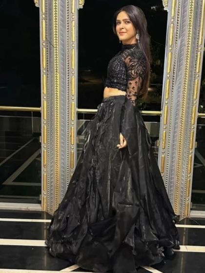 A duplicate of 170, a full-length shot of the black gown.