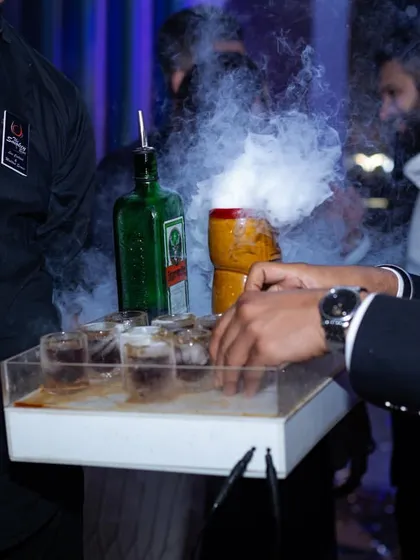 A tray of Jägermeister shots being served with a dramatic smokey effect. This is how I turn a simple round of shots into a memorable spectacle for your guests.