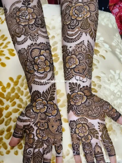 A collection of my floral-heavy bridal designs. I love using roses and leafy vines to create a flowing, elegant look that covers the hands and arms.