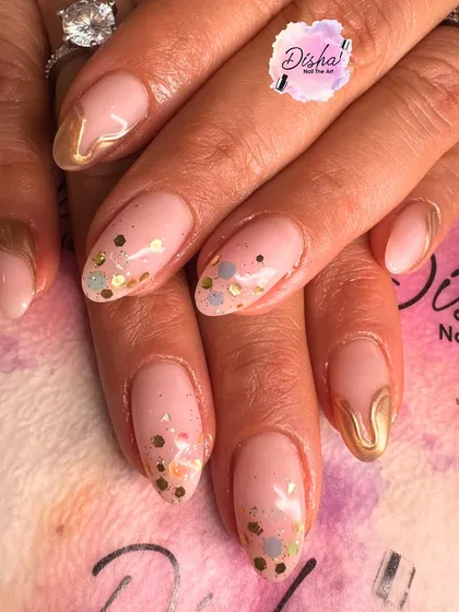 Another beautiful design from our weekly recap. This one features gold tips and a sprinkle of gold confetti.