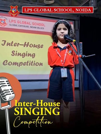 An Inter-House Singing Competition provides a platform for our young vocalists to shine. This image of a student performing with confidence reflects our commitment to nurturing musical talent and stage presence from an early age.