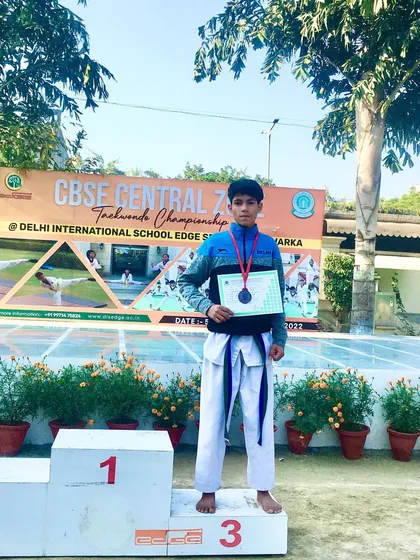 Sorav Sen on the podium with his bronze medal at the CBSE Central Zone Taekwondo event in the U-17, U-45kg category.