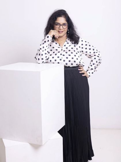 The right pose and outfit can completely shift your presence. Here, the thoughtful styling allows Kala's confident and contemplative side to shine through, proving that your wardrobe can be a powerful tool for storytelling.