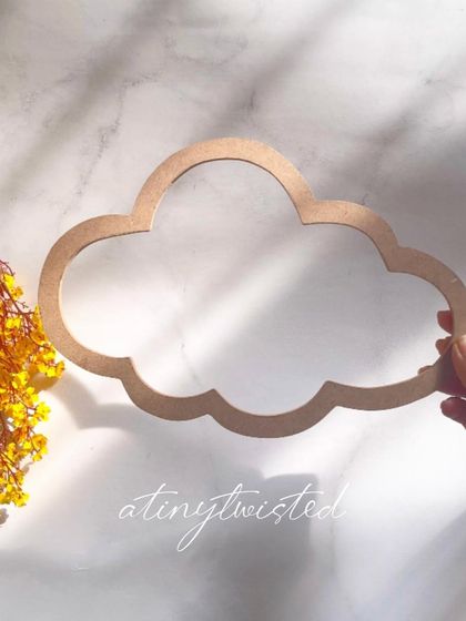 The cloud-shaped MDF frame is another one of my popular supplies. It's perfect for making whimsical wall art, especially for kids' rooms and nurseries.