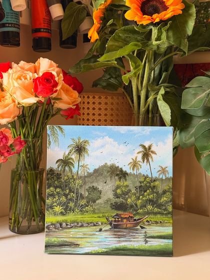 The Kerala painting styled with flowers in my studio, creating a beautiful, nature-inspired vignette.