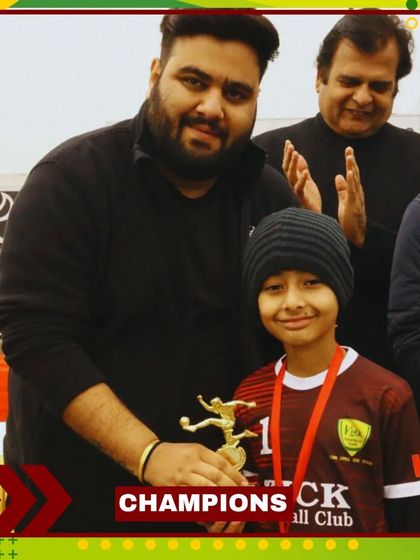 Celebrating our champions. A player receives his trophy, a symbol of his excellent performance and teamwork.