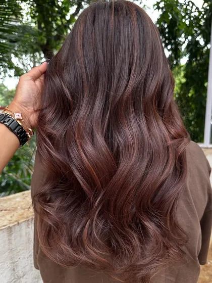 A classic 'Chestnut Brown'. This is a timeless and elegant color that suits so many skin tones. It’s rich, warm, and full of shine.