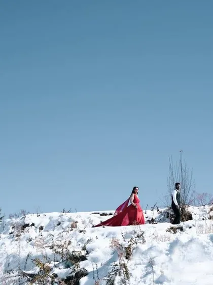 This is what it feels like when your love is the most vibrant thing in a world of white. For me, a pre-wedding shoot is about finding a landscape as grand as your journey and capturing a moment of pure, cinematic magic. This is more than a photo; it's a feeling.