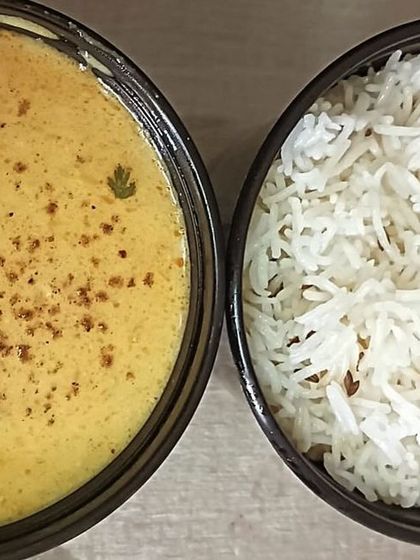 A serving of Half Kadi and Half Rice. The perfect way to enjoy this classic dish in a controlled portion size.