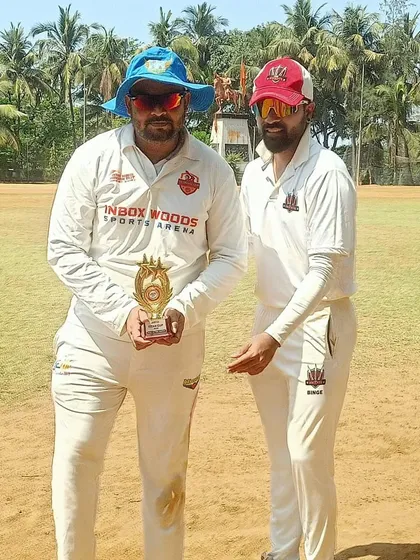 Another century from a champion batsman. Our player Amit Rathod receives a trophy for scoring another hundred in a competitive match.