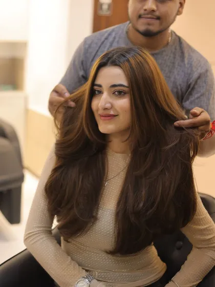 This client is loving her new hazel brown colour and fresh layered cut. The style is perfect for adding volume and framing her face.