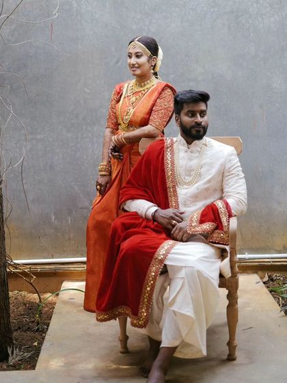 A duplicate of the regal portrait with the groom seated.