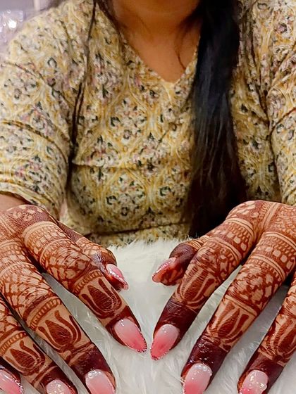 A full view of the stunning bridal ombré nails, showing how they create a cohesive and elegant look for the bride's special day.