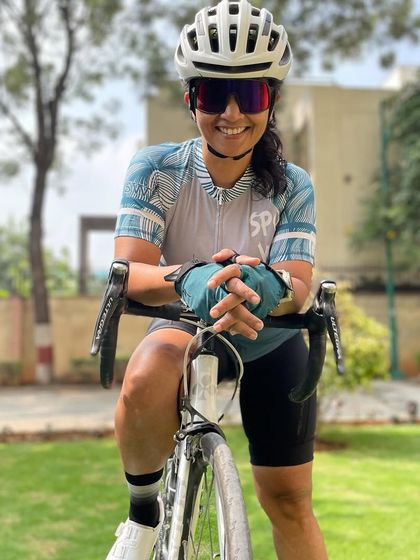 We love when creativity comes from within the tribe! This jersey was born from a doodle by one of our member's talented kids. Here, a Spokie proudly wears the finished product, a beautiful blend of community inspiration and professional design.