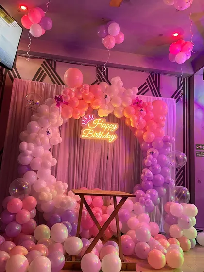 The decoration with the cafe's ambient lighting, creating a warm and inviting atmosphere.