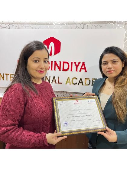 Another student successfully completes her course, ready to apply her skills in the real world.