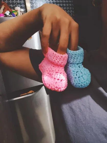 I made these tiny, soft crochet baby booties, and my heart just melted. Available in different colors, they are handmade with cozy yarn to be super gentle on a baby's feet, making them a perfect baby shower gift.