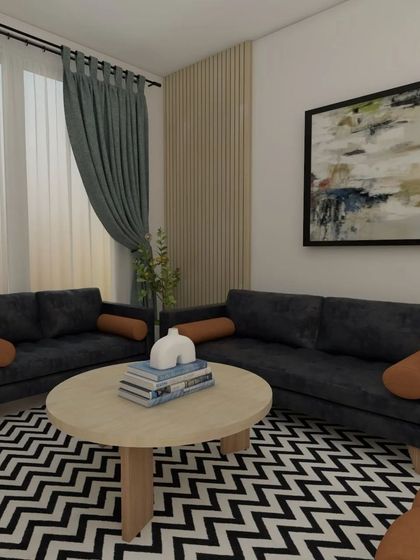 Another view of the Scandinavian-inspired living room design. The abstract art and simple furniture pieces contribute to the minimalist yet cozy aesthetic.