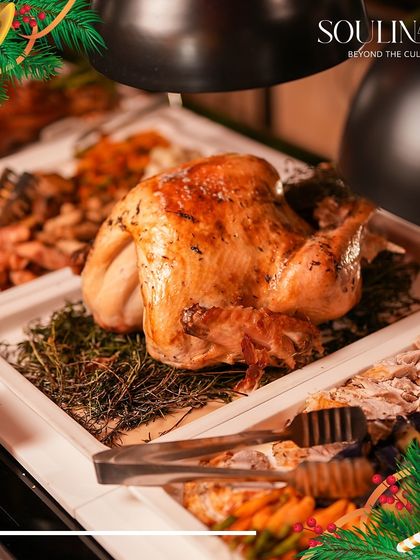 A perfectly roasted turkey, the centerpiece of a Christmas feast. Our chefs masterfully prepare traditional holiday dishes to bring the spirit of the season to your table.