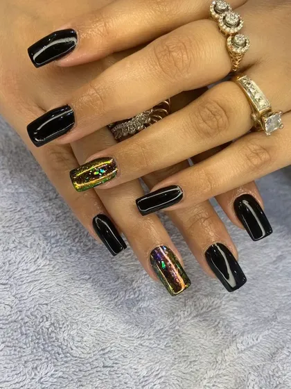 A full view of the chic black and multi-chrome cat eye set, perfect for a bold and modern look.