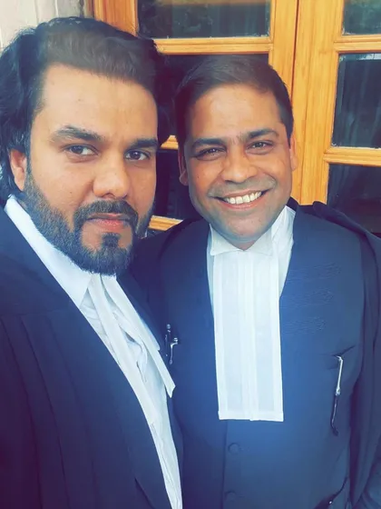 With my elder brother and Senior Advocate, Ardhendu Mauli Kumar Prasad. Learning from the best is a constant part of my professional journey.