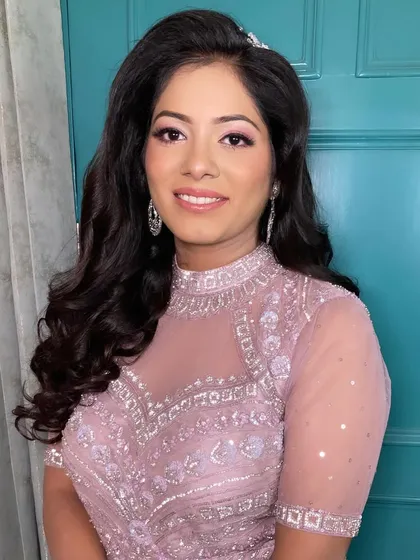 A soft engagement glam look for my bride Neha. The focus was on pink-toned eyeshadow and a natural, skin-like finish.