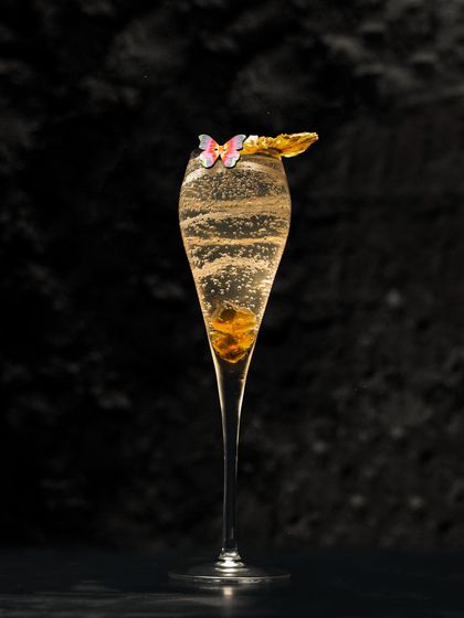 Our Peach and Lavender Bellini is a sparkling sensation crafted to perfection. The delicate bubbles and edible garnish make it an elegant choice for any occasion.
