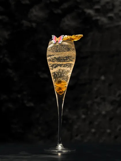 Our Peach and Lavender Bellini is a sparkling sensation crafted to perfection. The delicate bubbles and edible garnish make it an elegant choice for any occasion.