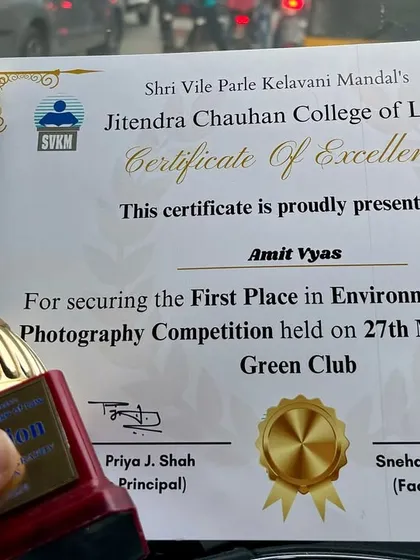 The Certificate of Excellence and trophy from the Green Club's Environment & Wildlife Photography Competition. Every award is a motivation to keep exploring and telling the stories of the wild.
