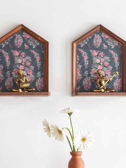 A snippet of the Prangan home, showcasing the antique brass musician sculptures that add a touch of history and artistry to the foyer.