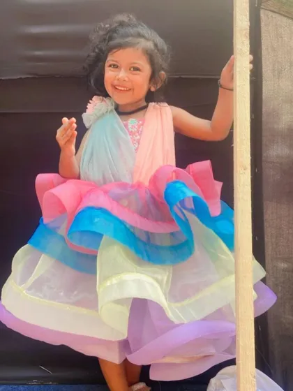 A vibrant and joyful photo from a young participant's portfolio.
