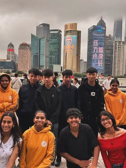 A group photo with some new friends we made in Shanghai. These cross-cultural connections are what make our tours so special.