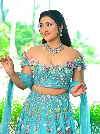 The joy and magic of this look are evident in her expression. It's a perfect blend of creative artistry and beautiful, wearable makeup.