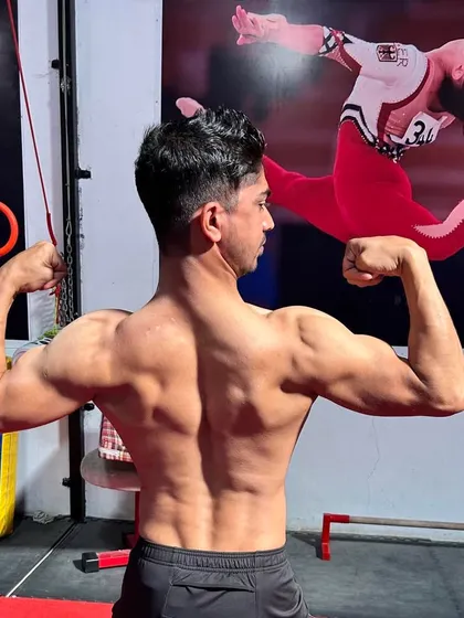 As the founder and a national gold medallist, I lead by example. The physique you see is built from years of dedicated gymnastics and calisthenics, the same principles we teach at our academy.
