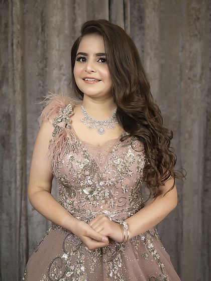 Your hairstyle determines your attitude. These soft, bouncy curls are perfect for an engagement or reception, making our client feel confident and beautiful.