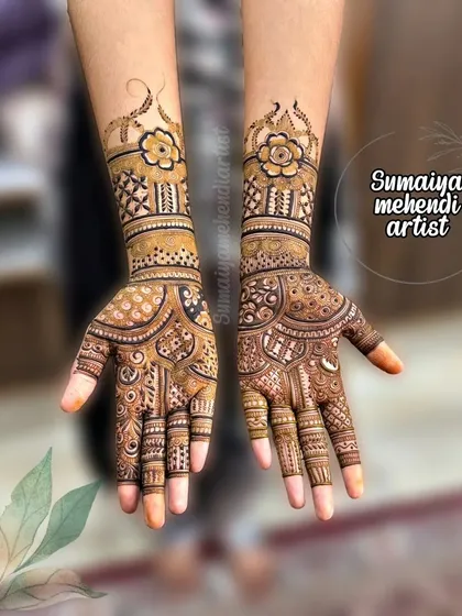 Another angle of this beautiful Indian mehendi design, showing the intricate details on the wrists.