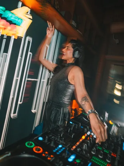 A candid shot of me dancing and enjoying the music during our set in Navi Mumbai. It's important for me to be just as into the party as the crowd is.