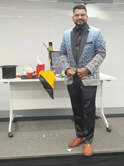Posed and ready for a corporate event. I provide professional, polished entertainment that is perfect for company parties, client appreciation events, and product launches.
