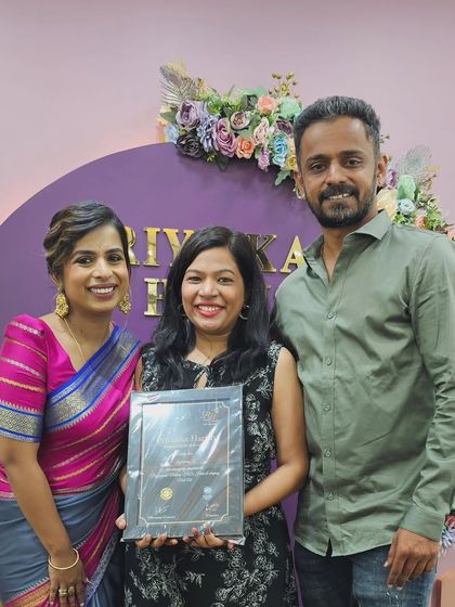 Celebrating my certification with my family and my mentor. Their support means the world to me and motivates me to work hard.