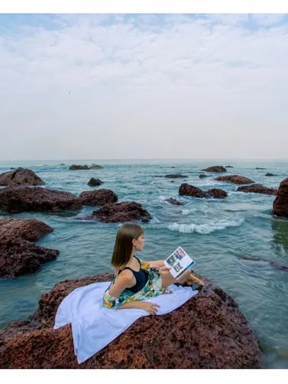Campaign photography can be indirect yet impactful. This serene shot for The Westin Goa shows a guest enjoying a quiet moment of reading by the sea, selling a feeling of peace and escape.