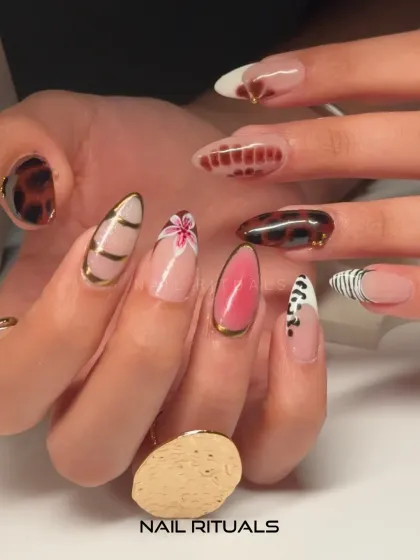 A closer look at the creative details. This image highlights the gold chrome outlines, the pink floral art, and the unique patterns that make this set a standout.