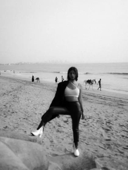 An editorial-style beach shoot with an edgy, high-fashion look. The mix of color and black and white images shows the versatility of a single location.
